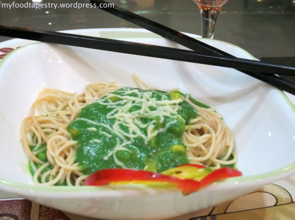 Spinach puree on a bed of soft pasta